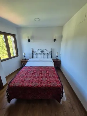Cama o camas de una habitación en Apartamentos Rio Almar