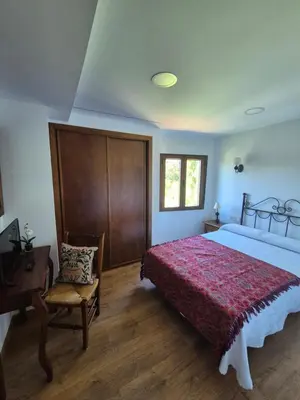 Cama o camas de una habitación en Apartamentos Rio Almar