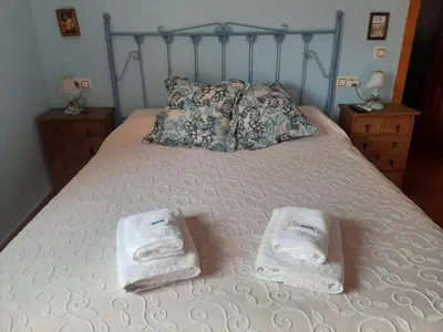 Cama o camas de una habitación en Casa Rural Parada Real CR-CC-00258