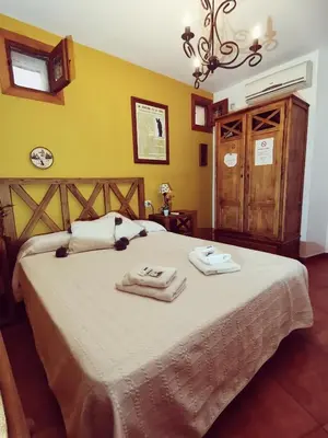 Cama o camas de una habitación en Casa Rural Parada Real CR-CC-00258