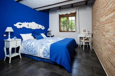 Cama o camas de una habitación en La Costanilla de los Angeles