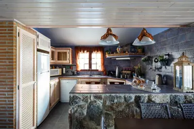 Una cocina o zona de cocina en La Costanilla de los Angeles