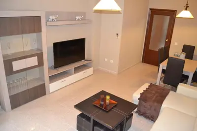 Una televisión o centro de entretenimiento en Apartamento Santa Eulalia