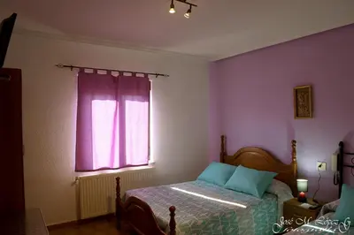 Cama o camas de una habitación en Hostal Restaurante El Final