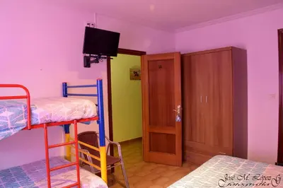 Cama o camas de una habitación en Hostal Restaurante El Final