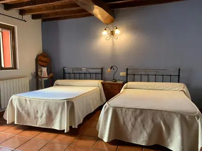 Cama o camas de una habitación en Casa Rural Churruca