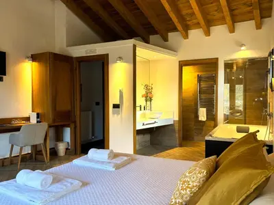 Cama o camas de una habitación en Hotel Gredos María Justina