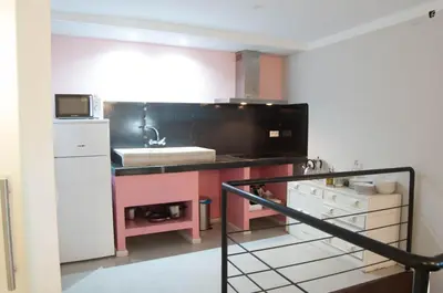 Una cocina o zona de cocina en Apartamentos de la Parte Antigua de Cáceres