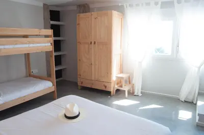 Cama o camas de una habitación en Apartamentos de la Parte Antigua de Cáceres