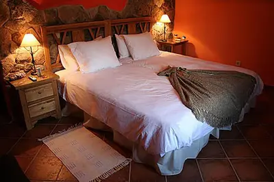 Cama o camas de una habitación en La Guarida del Oso