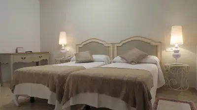 Cama o camas de una habitación en Hotel Rural Eloy