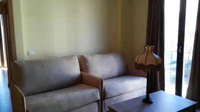 Zona de estar de Apartamentos Turísticos La Garza