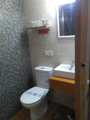 Un baño de Apartamentos Turísticos La Garza