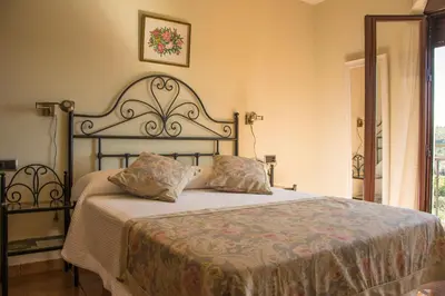 Cama o camas de una habitación en Casa Rural Fuente El Boticario