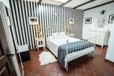 Cama o camas de una habitación en Versatil Apartamentos
