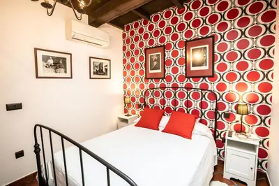 Cama o camas de una habitación en Versatil Apartamentos