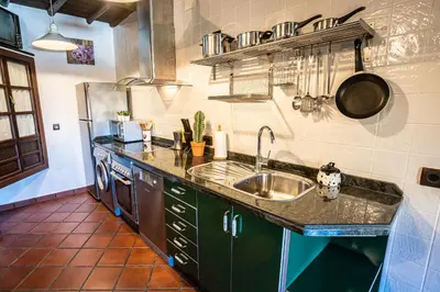 Una cocina o zona de cocina en Versatil Apartamentos