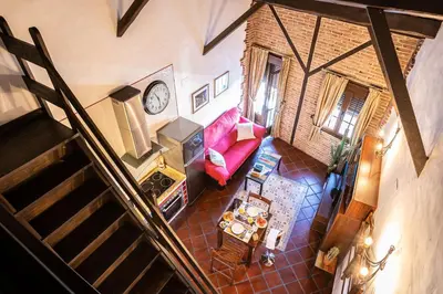 Zona de estar de Versatil Apartamentos