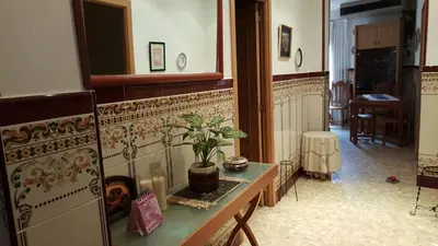 Una televisión o centro de entretenimiento en Casa Trini