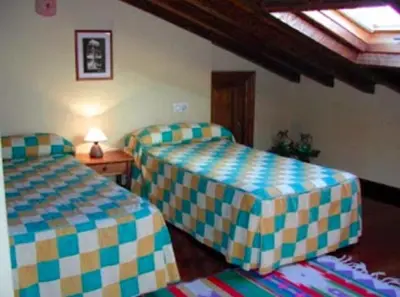 Cama o camas de una habitación en Casa del tablao