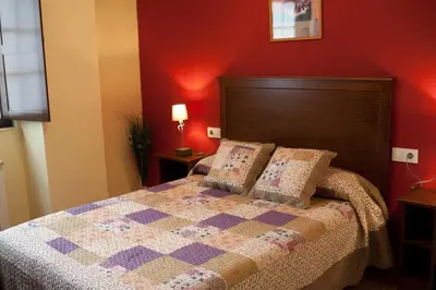 Cama o camas de una habitación en Apartamentos Rurales Sierra de Béjar