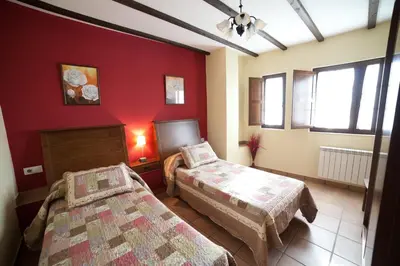 Cama o camas de una habitación en Apartamentos Rurales Sierra de Béjar