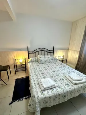 Cama o camas de una habitación en VUT de uso turístico Las Palomas