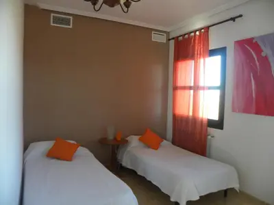 Cama o camas de una habitación en El Jardin de los Gatos Apartament