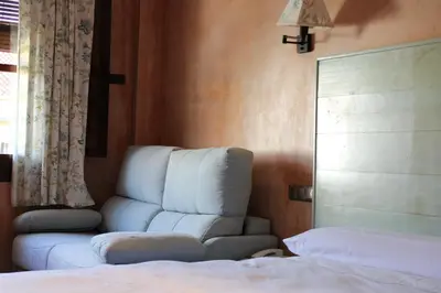 Cama o camas de una habitación en Hotel Rural Carlos I