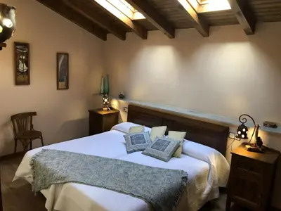 Cama o camas de una habitación en Casa Rural El Castaño