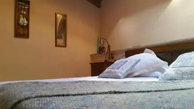 Cama o camas de una habitación en Casa Rural El Castaño
