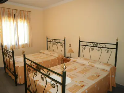 Cama o camas de una habitación en Hostal Miraflor de las Cadenas