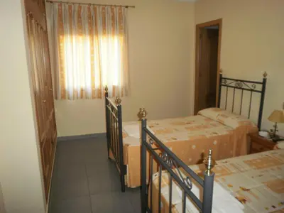 Cama o camas de una habitación en Hostal Miraflor de las Cadenas