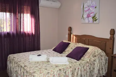 Cama o camas de una habitación en Casa Rural Casa Queta