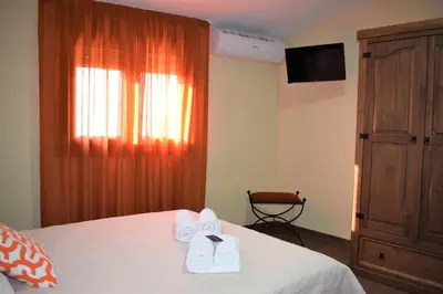 Cama o camas de una habitación en Casa Rural Casa Queta