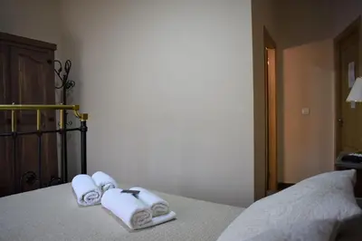 Cama o camas de una habitación en Casa Rural Casa Queta