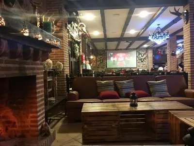 Zona de estar de Hotel Rural La Cabrera
