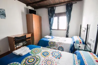 Cama o camas de una habitación en El Tirol