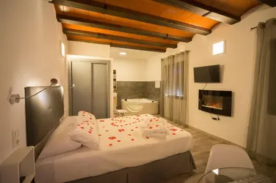 Cama o camas de una habitación en Estudios Rurales La Casa de Luis