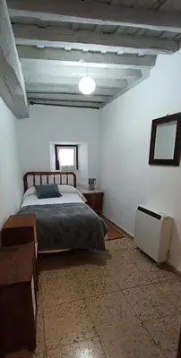 Cama o camas de una habitación en Casa de la Cigüeña