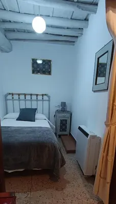 Cama o camas de una habitación en Casa de la Cigüeña