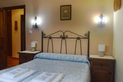 Cama o camas de una habitación en Casa Rural Los Olivos