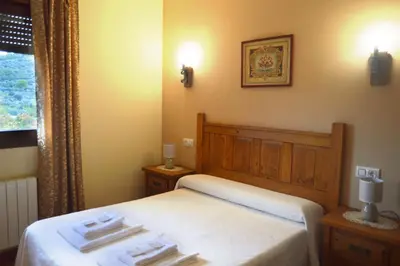 Cama o camas de una habitación en Casa Rural Los Olivos