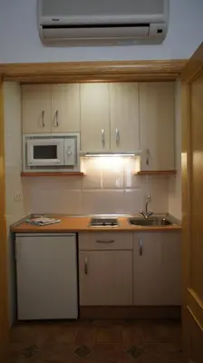 Una cocina o zona de cocina en Hotel Apartamentos Kantara Al-Saif