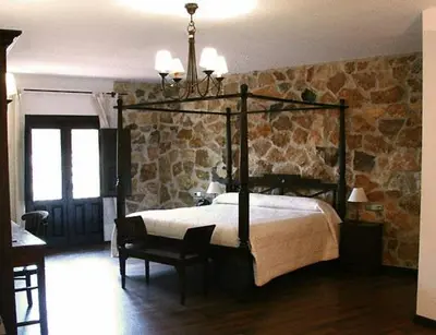 Cama o camas de una habitación en Hotel Spa Villa de Mogarraz