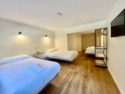 Cama o camas de una habitación en Hostal Mindanao