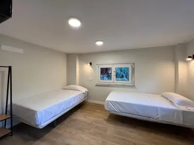 Cama o camas de una habitación en Hostal Mindanao
