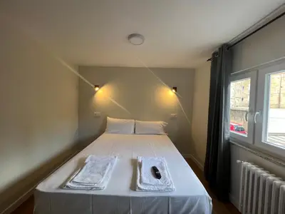 Cama o camas de una habitación en Hostal Mindanao
