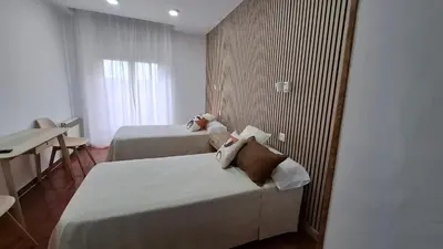 Cama o camas de una habitación en Hostal Bellas