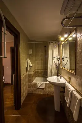 Un baño de Hostal Goya Suites